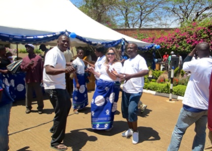 Dancing at the Open Day with members of the SACCO